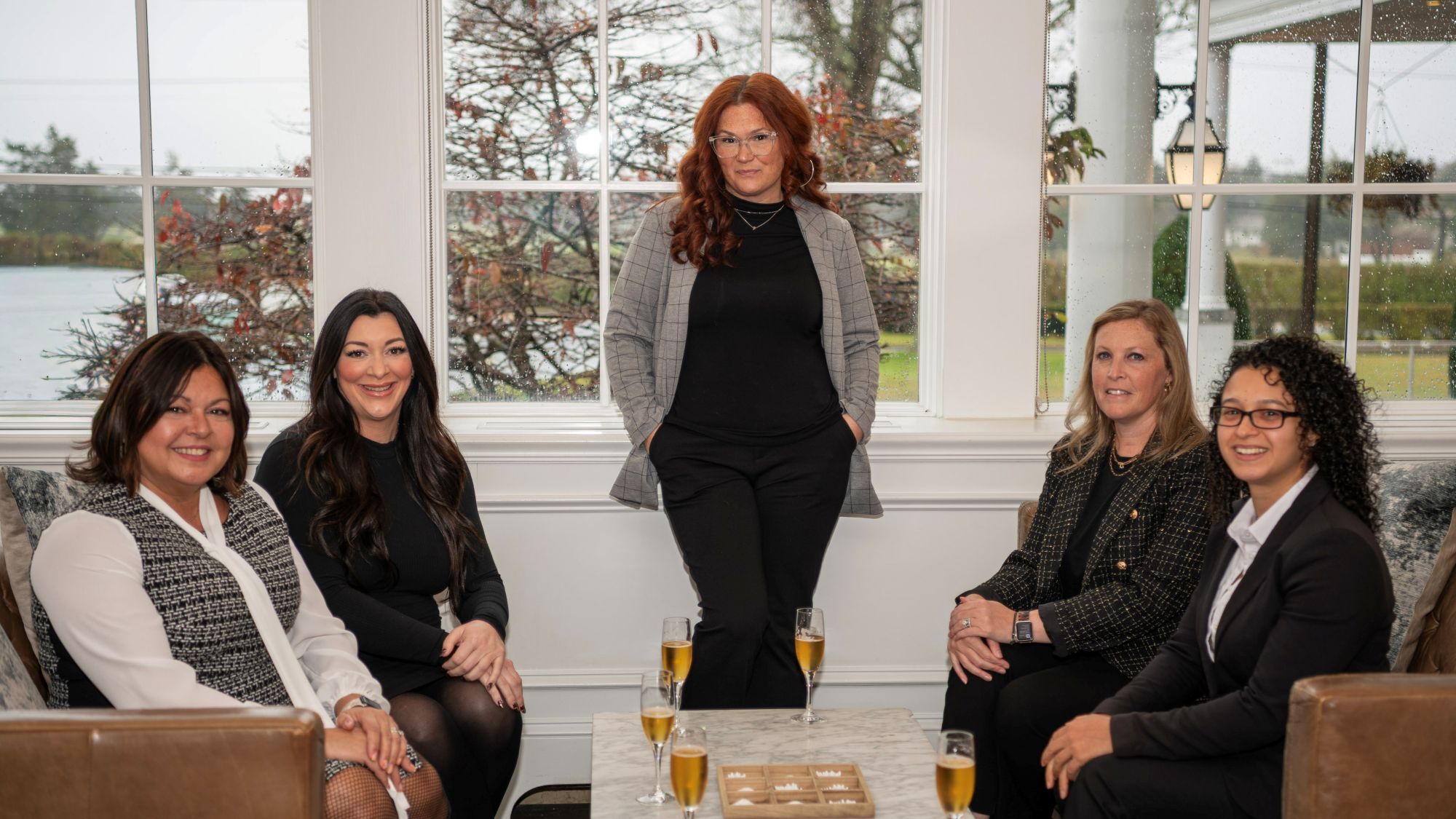 a group of women sitting in a room